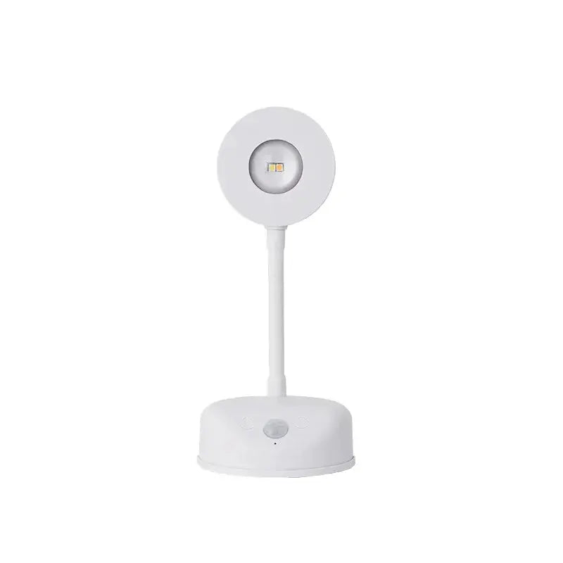 Night light motion sensor USB LED lamp by Simples Market, white circular head on a stand