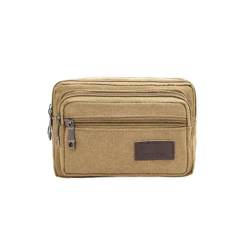 Canvas tan waist bag with multiple zip pockets and front patch label
