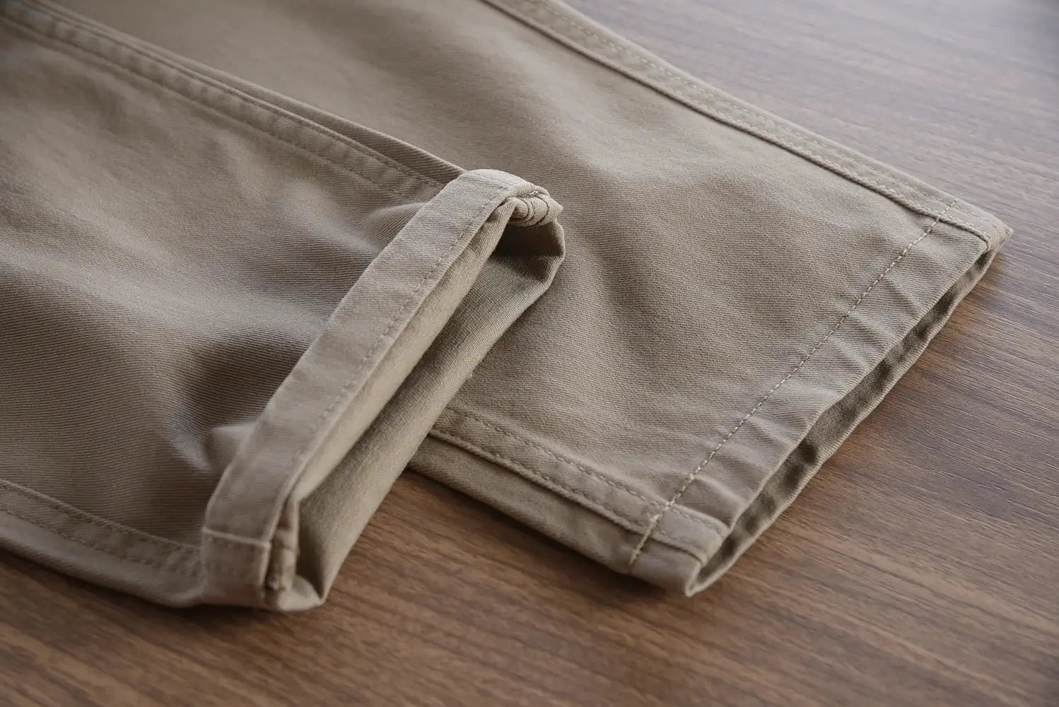 Men's tan twill chinos with rolled hem, washed 100% cotton.