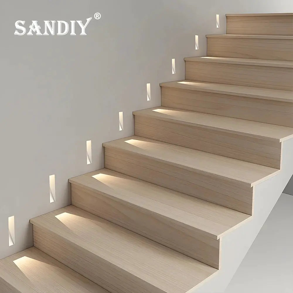 SANDIY sensor wall sconce lamp for stairs; recessed step lights along a wooden staircase, frameless, 3W warm white.