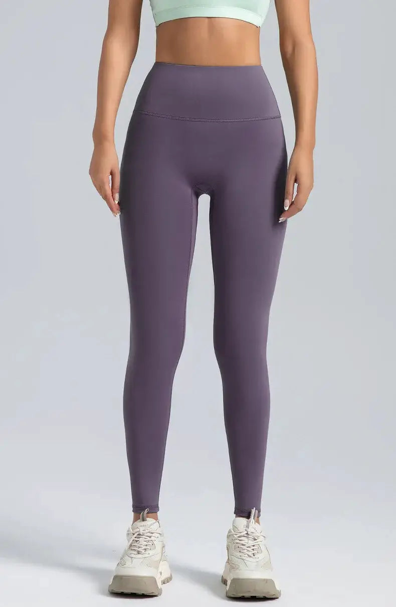 Purple high-waisted yoga leggings for women with abdominal compression
