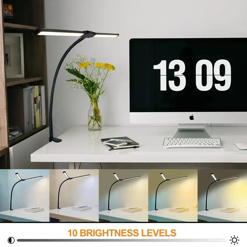 LED desk lamp by Simples Market with adjustable gooseneck, double-head design, black finish on white desk