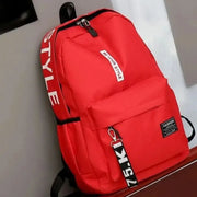 Red fashion backpack by Simples Market, large-capacity school bag with front pocket and black straps