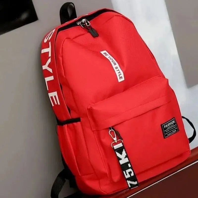Red fashion backpack by Simples Market, large-capacity school bag with front pocket and black straps
