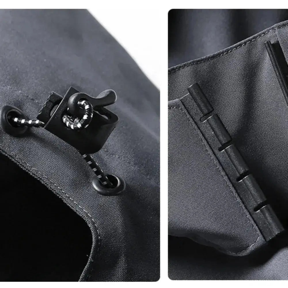 Men's black waterproof hooded rain jacket with adjustable drawcord toggle