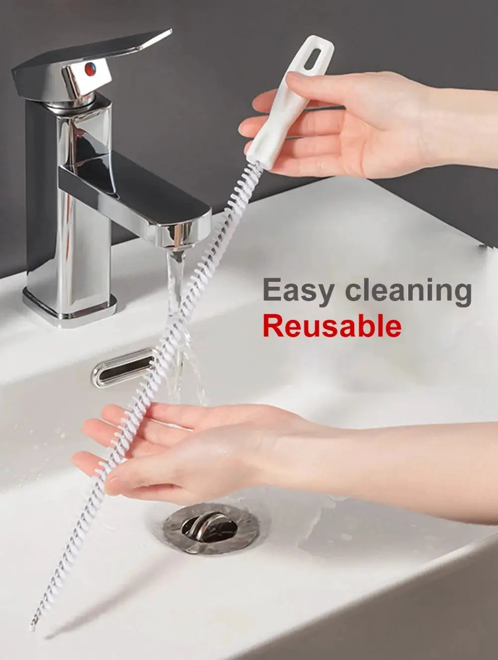 Pipe dredging brush with white plastic handle and flexible spiral drain cleaner