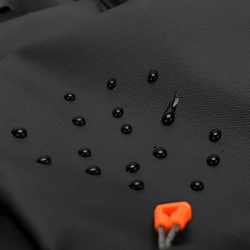 Simples Market luxury men's backpack in black waterproof fabric with orange zipper pull.