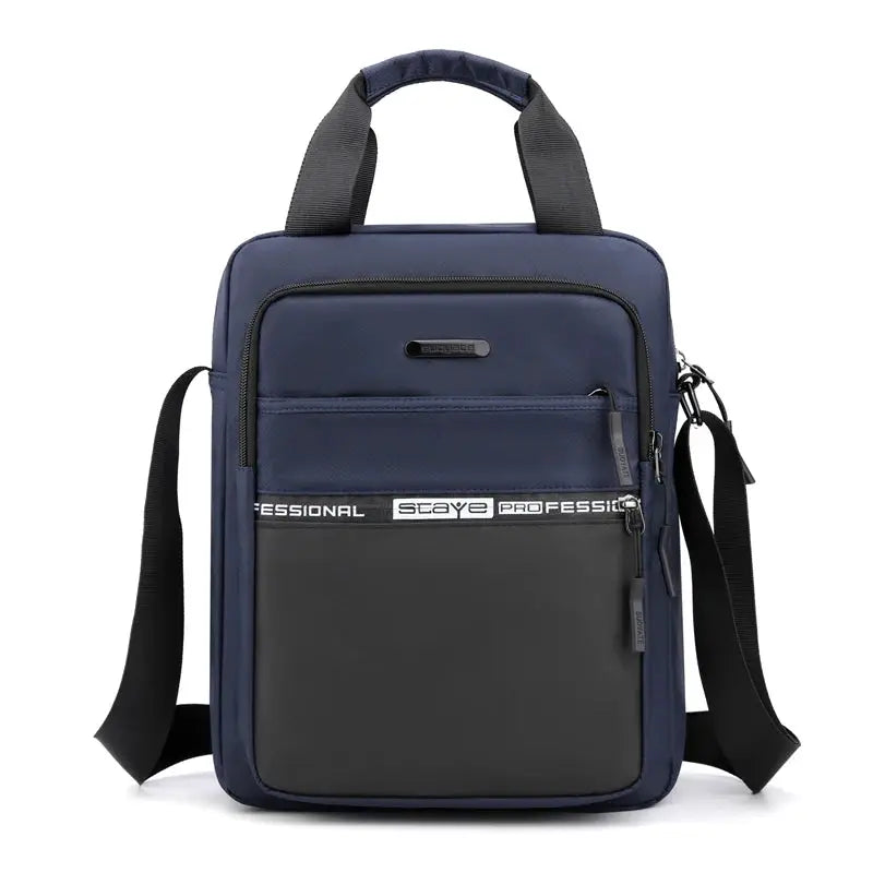 Men's navy crossbody bag by Simples Market with adjustable strap and front zip pocket.