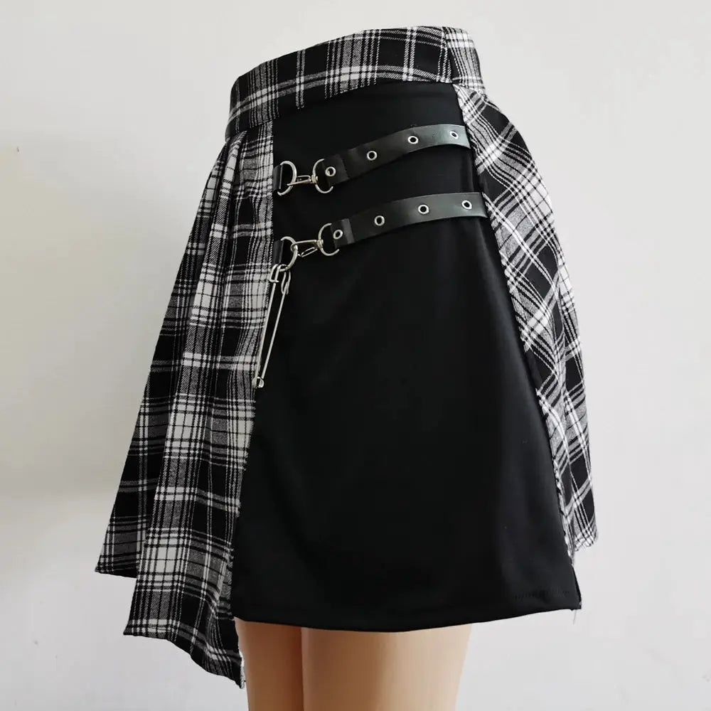 Simples Market Gothic plaid mini skirt in black with two silver-buckle leather straps across the back