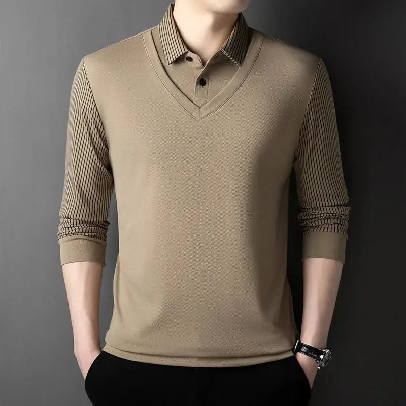 Men's long-sleeve polo top with layered look, tan body and striped sleeves.