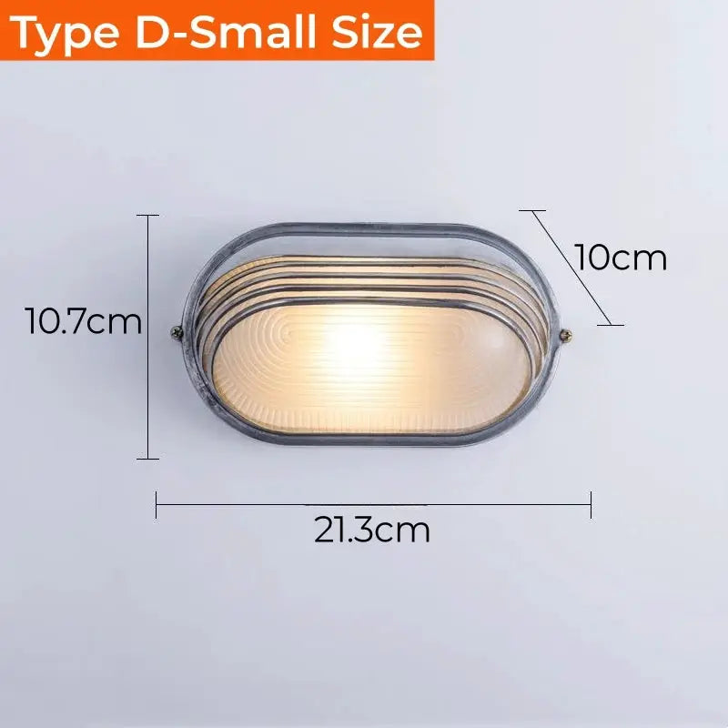Outdoor retro LED wall lamp by Simples Market, oval glass sconce with metal frame, IP65