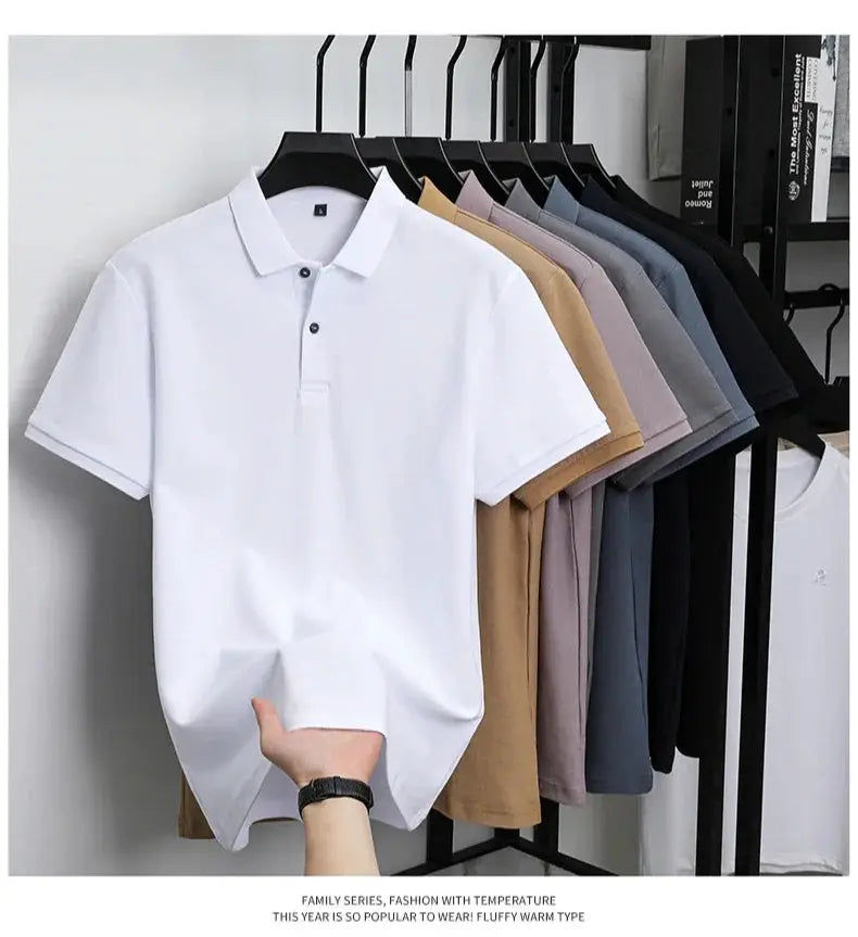 Men's 100% cotton polo shirts in assorted colors on a rack with a silk-like finish.