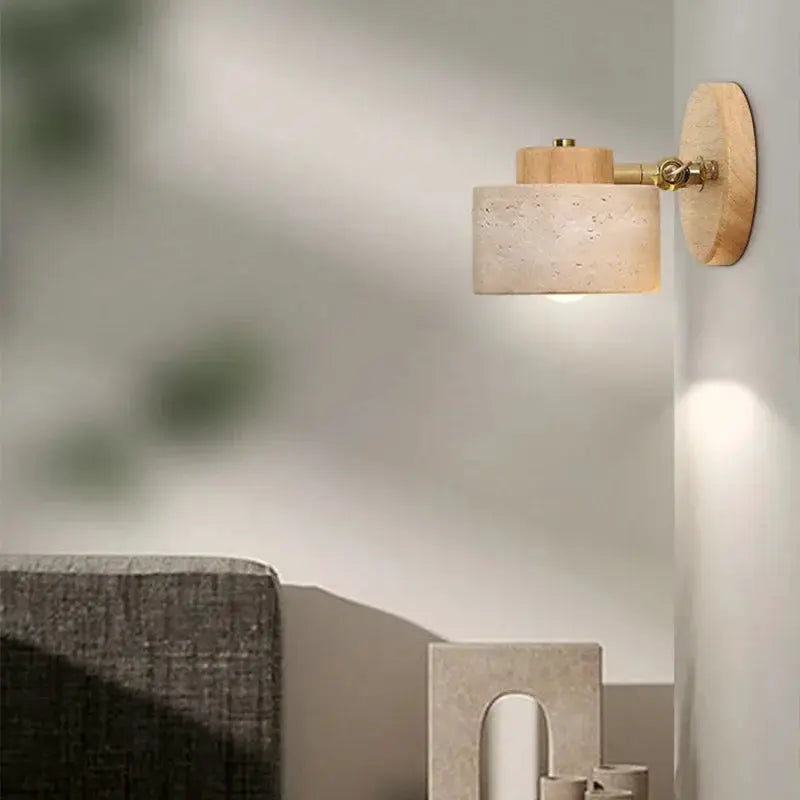 Yellow cave-stone Japanese-style bedside wall lamp with wooden mount, rotatable shade, and switch