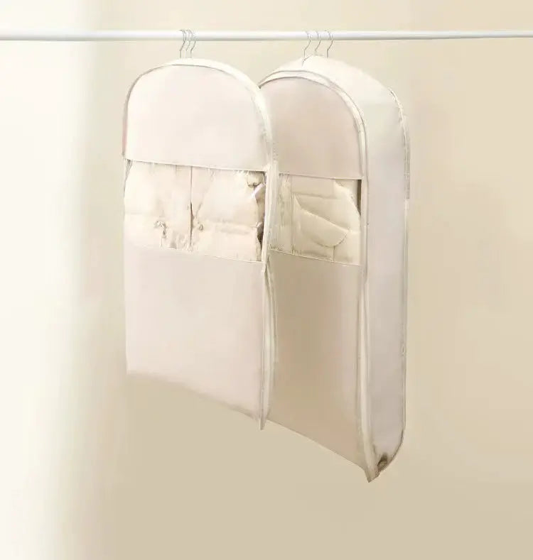 Two white hanging wardrobe compression organizers with zip pockets for jackets