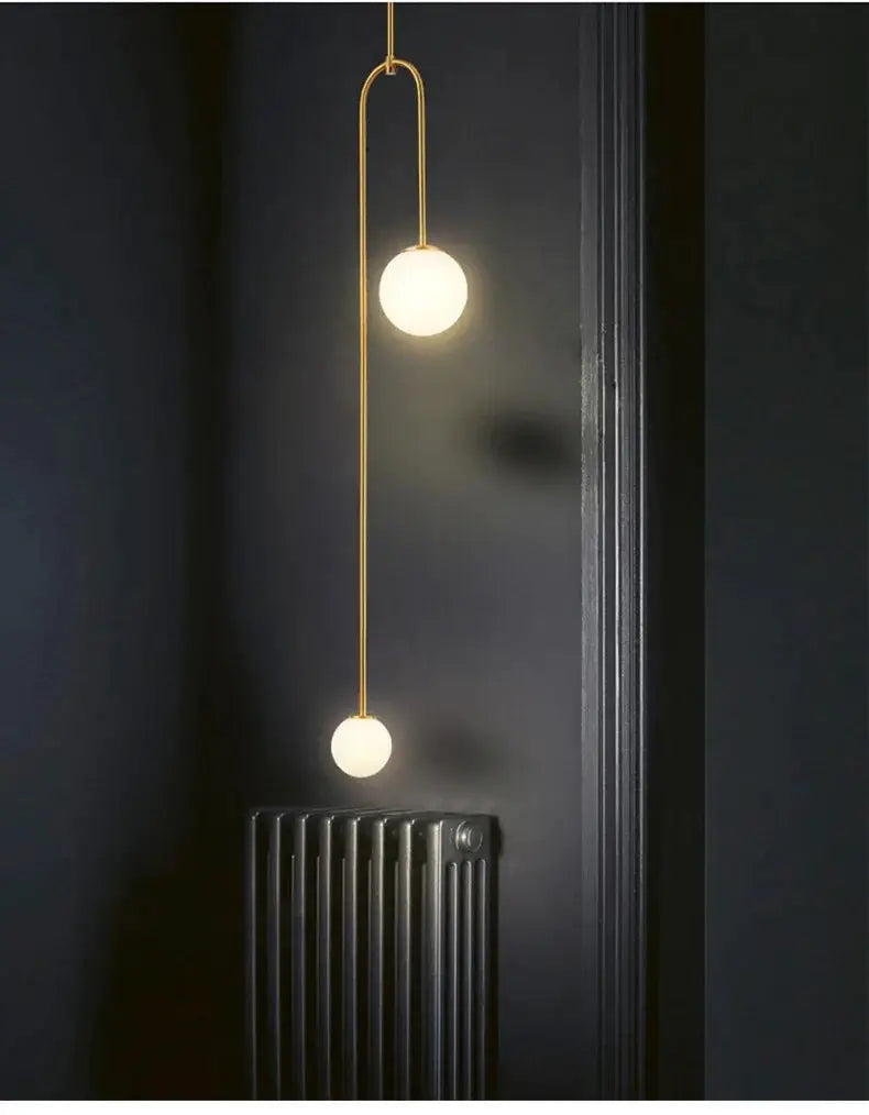 Nordic minimalist chandelier, geometric line pendant in gold brass with two glowing spheres