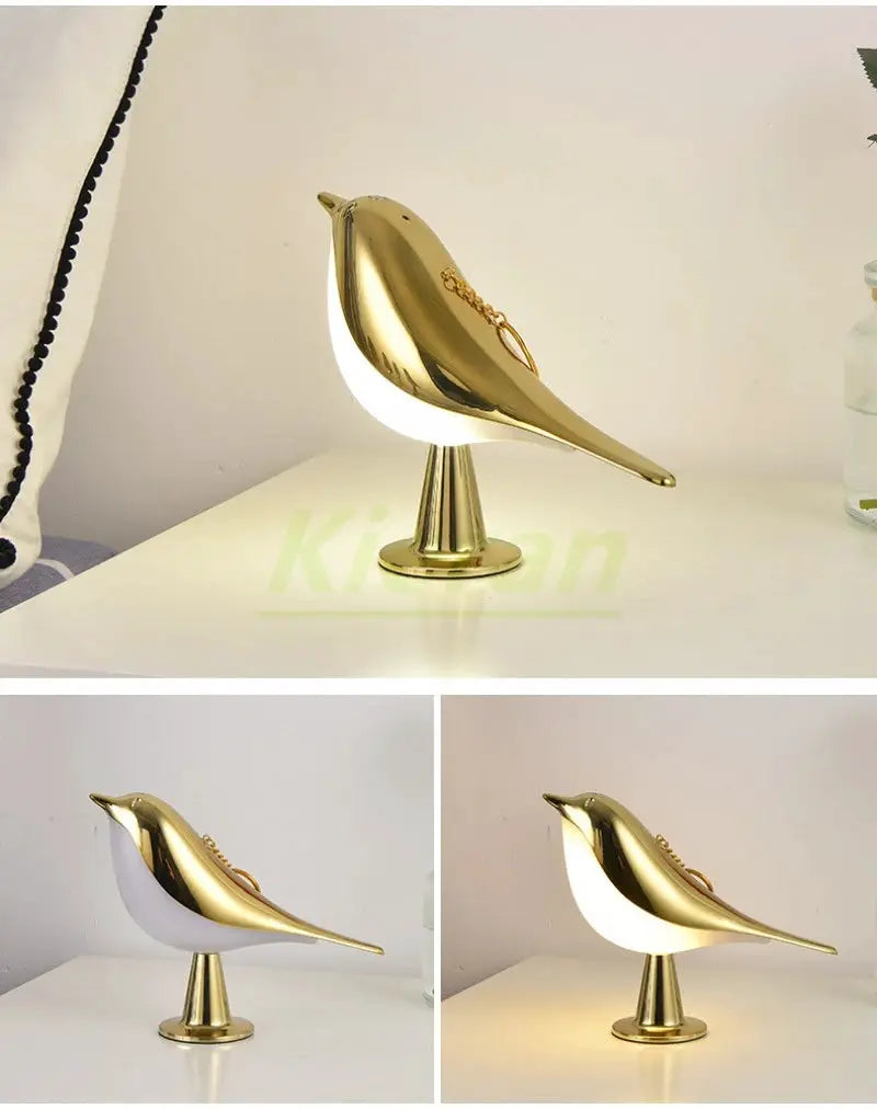 Magpie LED desk lamp in gold-tone metal with white underside; modern Nordic bird design by Simples Market