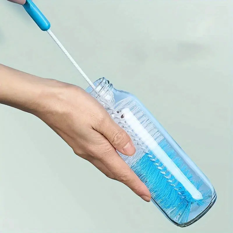Long-handle cup brush with blue bristles for cleaning a glass bottle