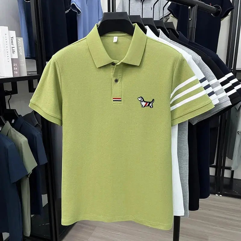 Polo shirt lime green short sleeves with embroidered dog logo on chest and striped placket, on display with other colors
