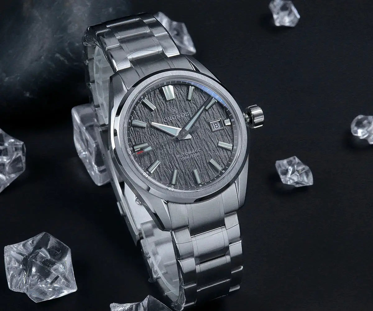 Cronos men's stainless steel watch with birch-pattern gray dial, date window, automatic movement, solid link bracelet