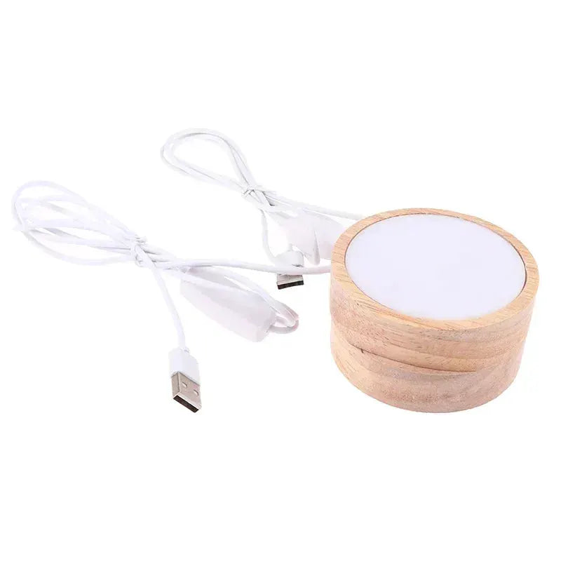 Round wooden LED night light base with white top and USB cable