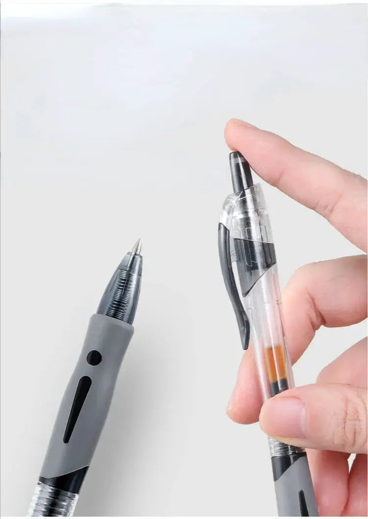 Simples Market retractable gel pens set; two pens shown with gray and transparent plastic bodies and metal tips.