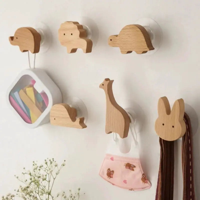 Wooden animal wall hooks set for kids, six pieces in natural wood finish by Simples Market