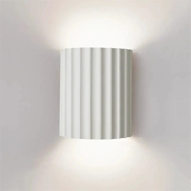 Nordic modern resin wall lamp, white ribbed cylindrical design, wall-mounted ambient lighting.