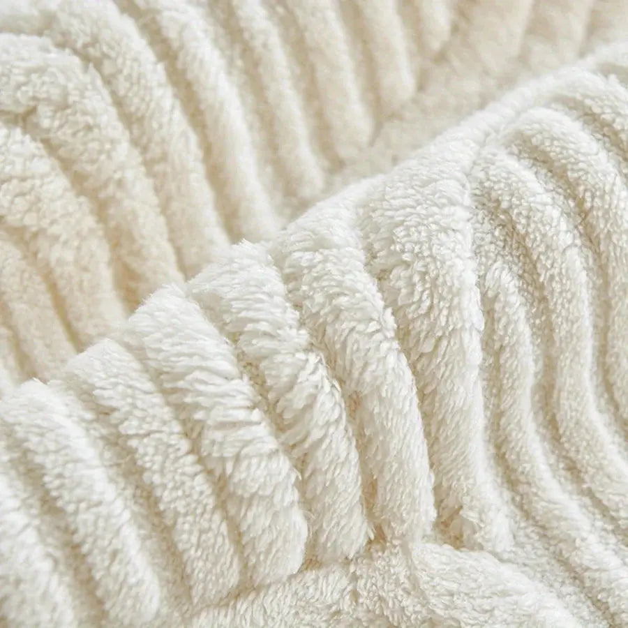 Velvet cream sofa cover with plush textured fabric for couch protection