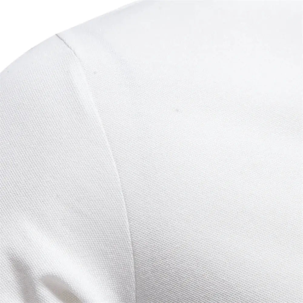 Men's white cotton polo shirt fabric close-up; short-sleeve, solid color.