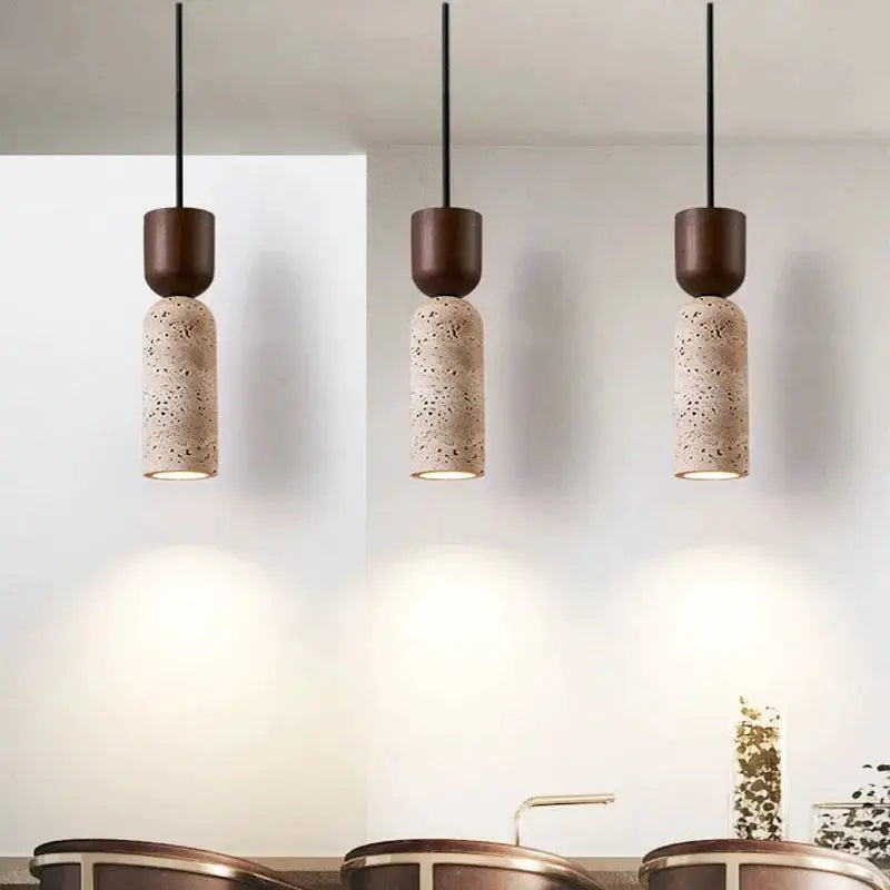 Pendant lights, three wabi-sabi bedside chandeliers with speckled beige cylindrical shades and dark brown caps.