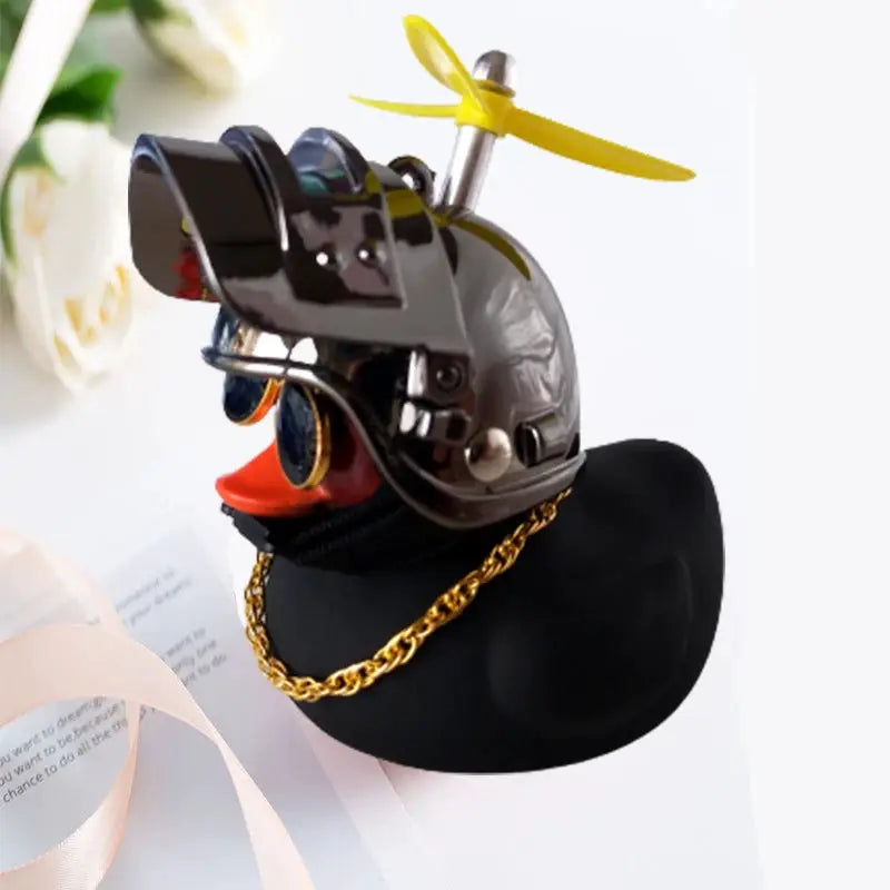 Yellow rubber duck car interior decoration with helmet and propeller