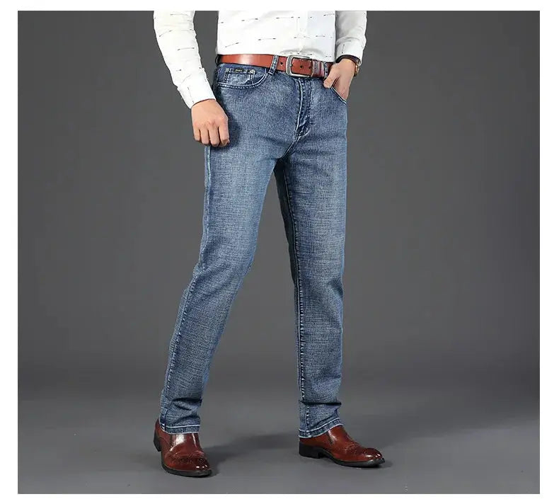 Wthinlee men's jeans, blue denim, casual straight-stretch fit with brown belt.