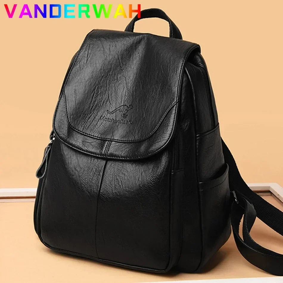 Genuine women's black leather backpack with flap, top handle and adjustable straps by Simples Market