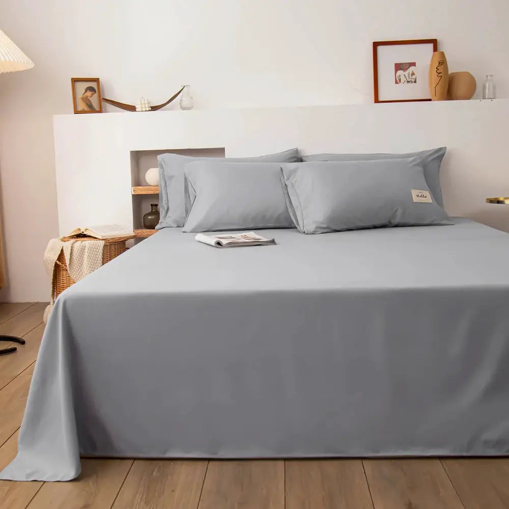 Gray bed flat sheet for double bed; solid color with matching pillowcases, Simples Market, Halo tag visible.