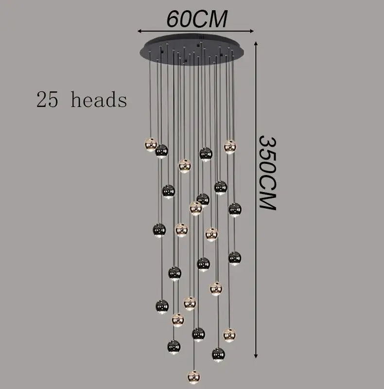 Pendant light fixture with 25 black and gold spheres hanging at varying lengths for a modern living room chandelier.