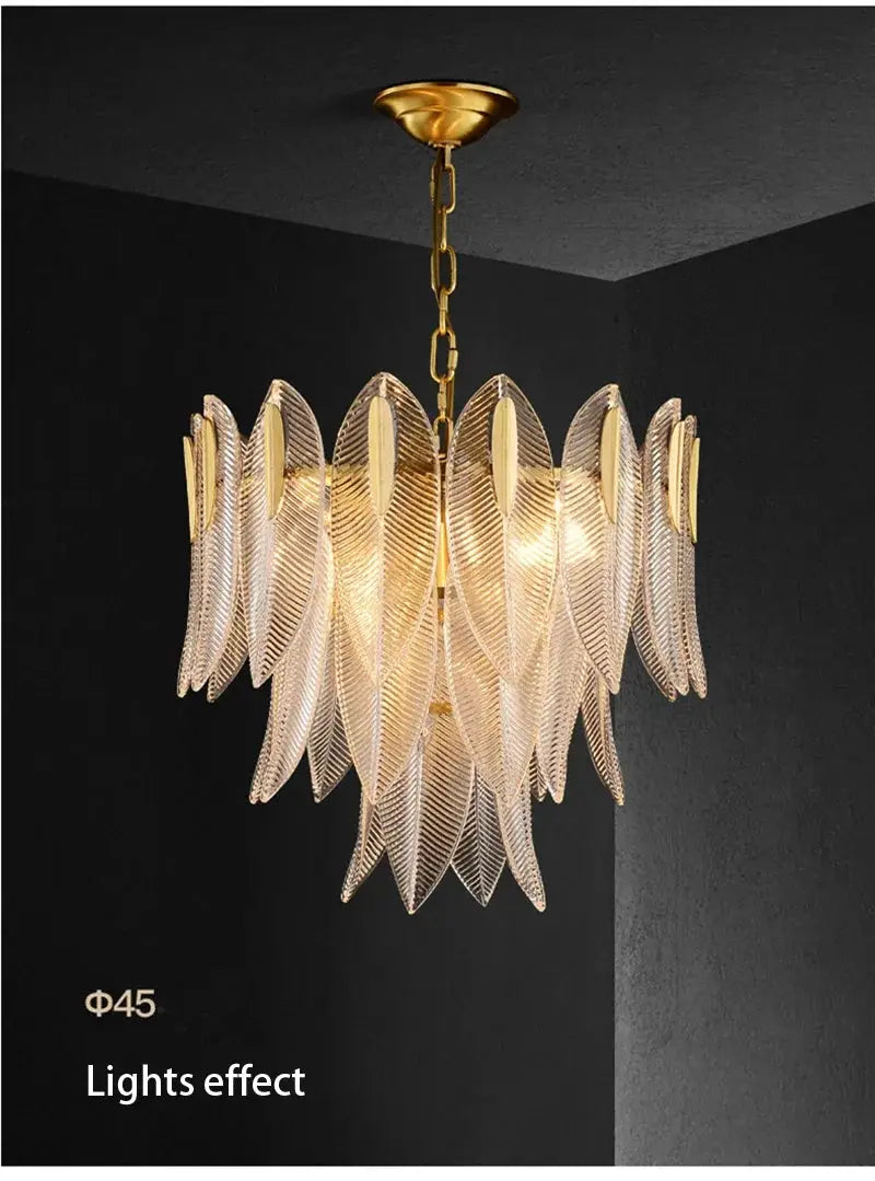 French Romantic glass chandelier with gold chain and leaf-shaped panels.