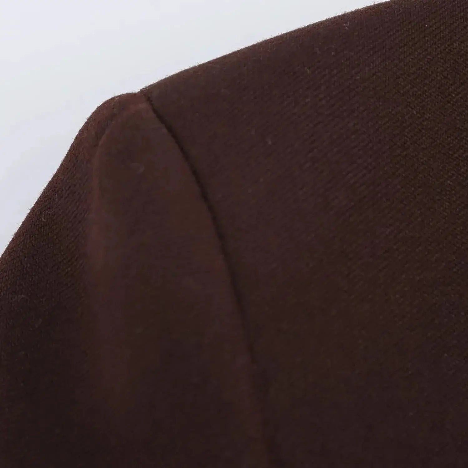 KONDALA brown blazer fabric close-up with seam line