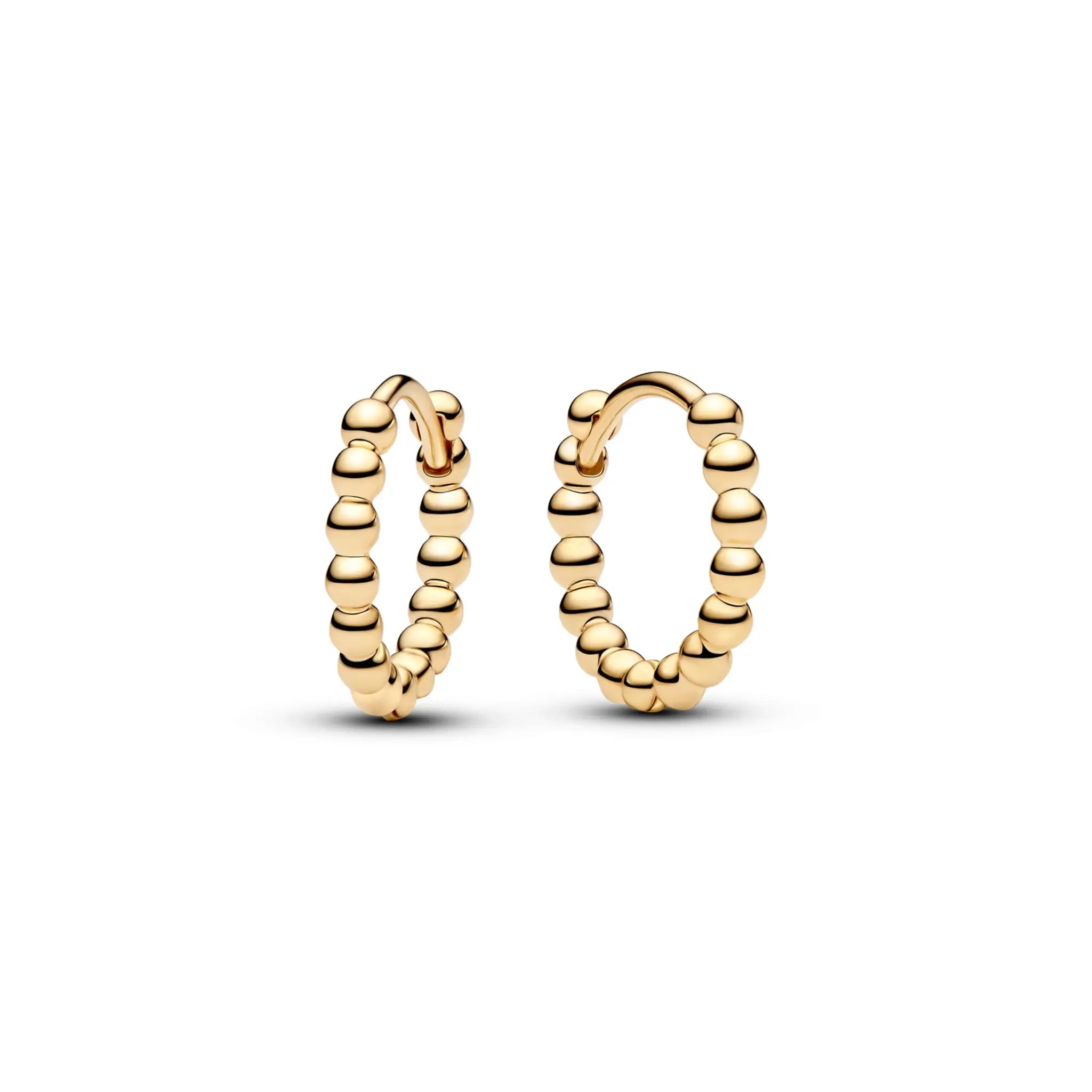 Pair of gold-tone bead rings on white background, Simples Market jewelry
