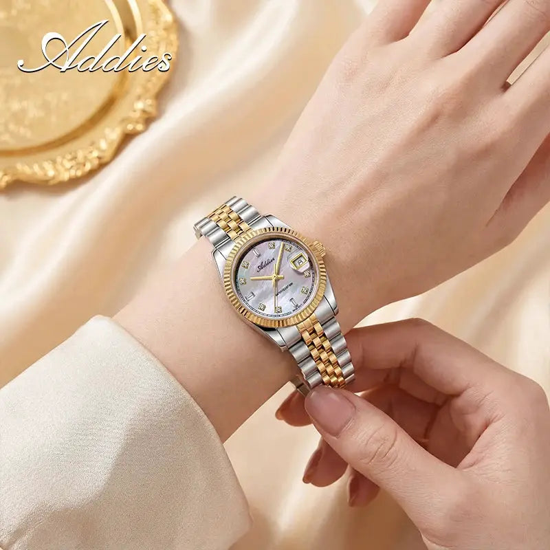 Adddies two-tone stainless steel women's wristwatch with gold bezel and diamond markers