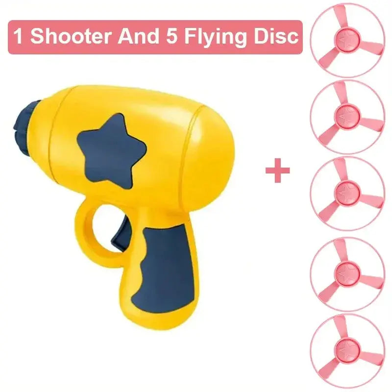 Yellow cat training toy gun with blue grip and star decal, includes 5 pink flying discs.