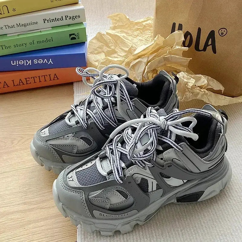 Brand Design sneakers Simples Market grey chunky with thick sole.