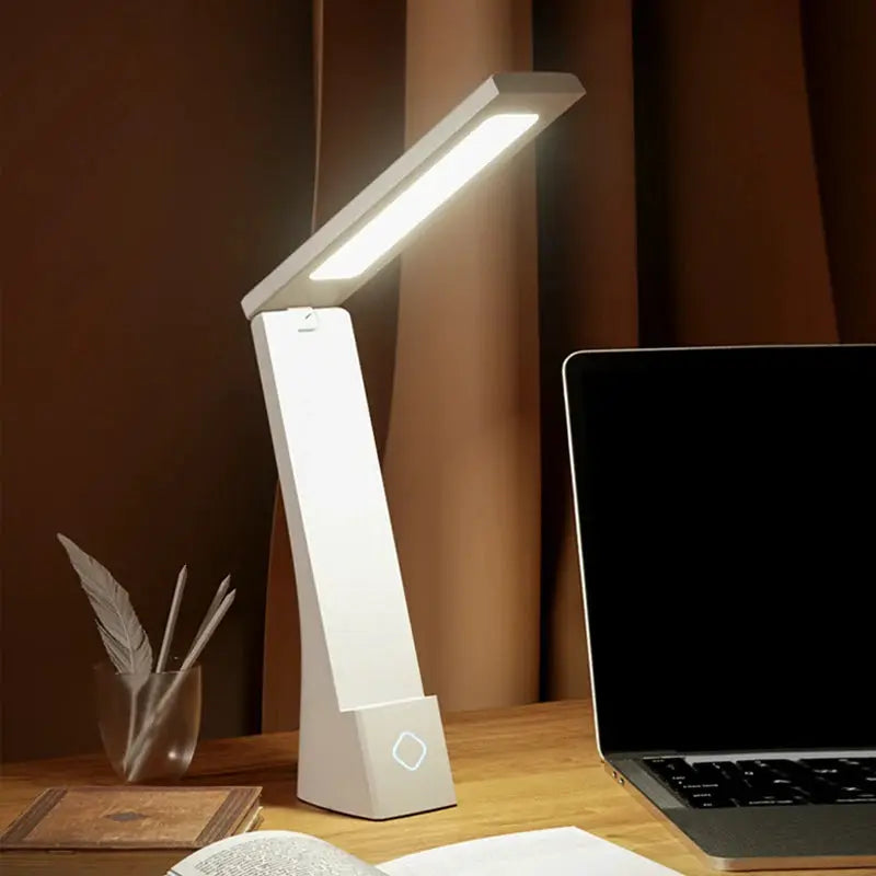 Simples Market white LED desk lamp with foldable arm and touch control base for study or bedside.