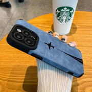 iPhone case by Simples Market: blue matte leather silicone with airplane motif and lens protection