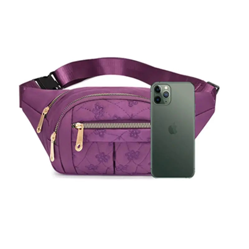 Women's purple Oxford waist bag with floral pattern, gold-tone zippers, adjustable strap