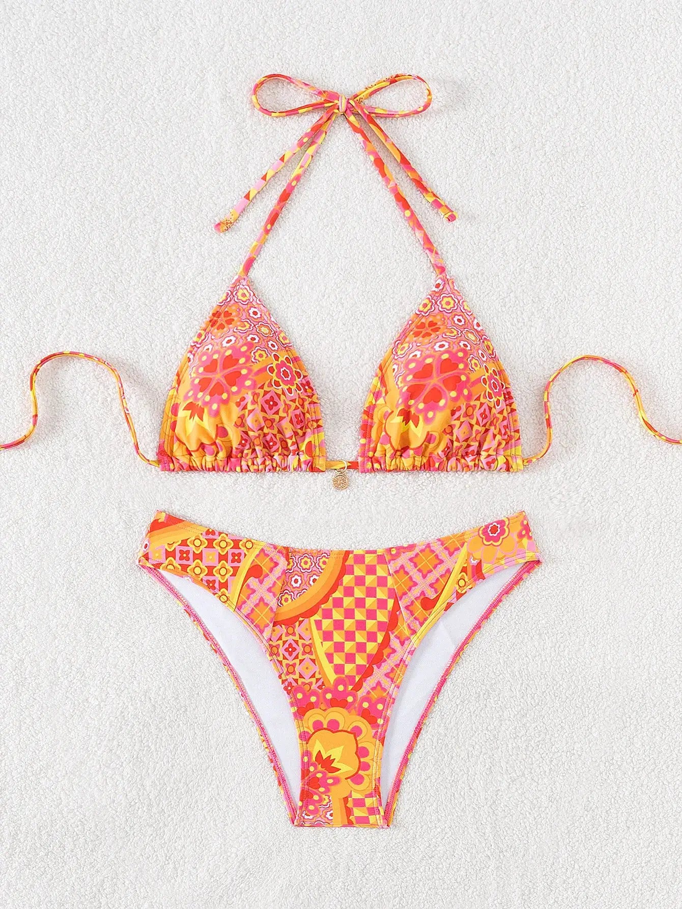 Triangle bikini set by Simples Market in orange-pink floral print with push-up top and Brazilian-cut bottoms