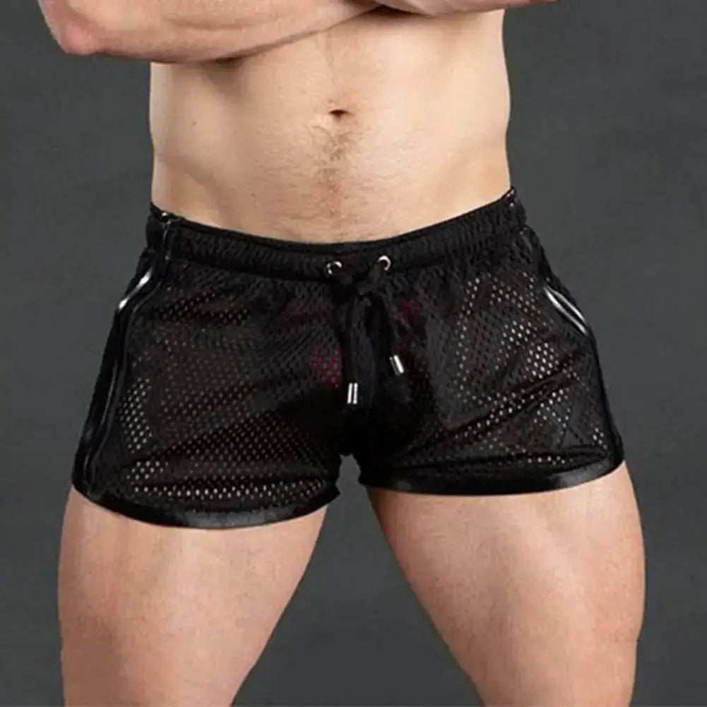 Men's black mesh sport shorts by Simples Market with drawstring and elastic waist.