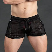 Men's black mesh sport shorts by Simples Market with drawstring and elastic waist.