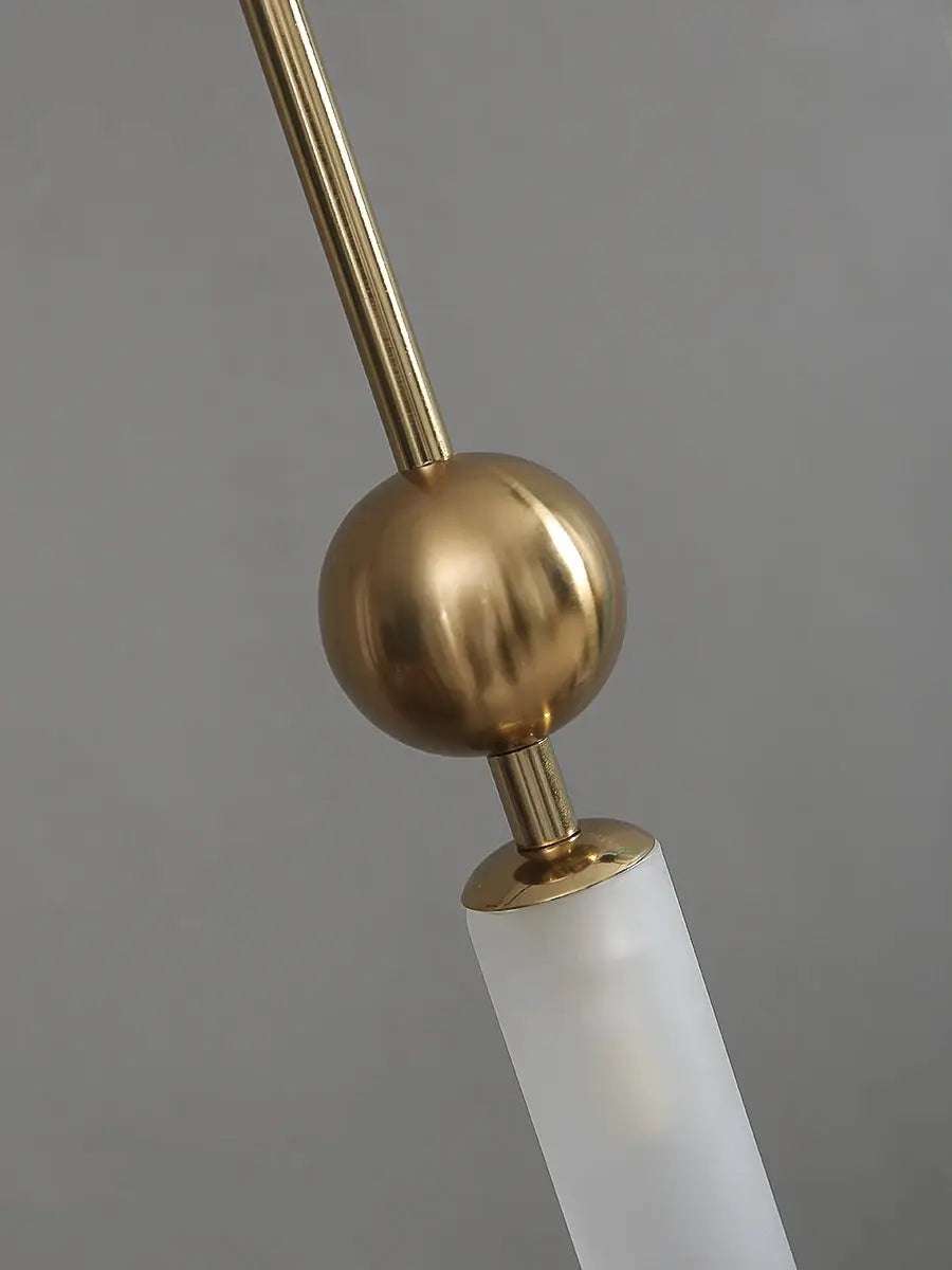Nordic light luxury pendant lamp with gold finish and frosted glass shade by Simples Market
