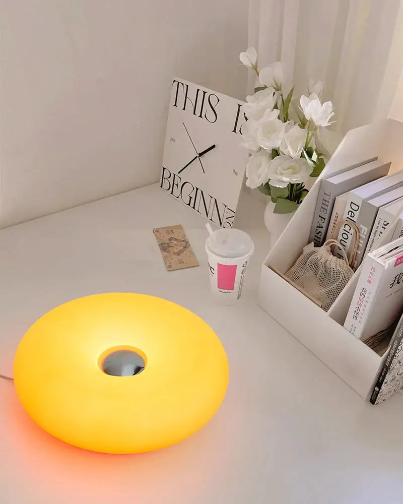 Bauhaus donut table lamp by Simples Market; USB-powered, warm yellow ambient light
