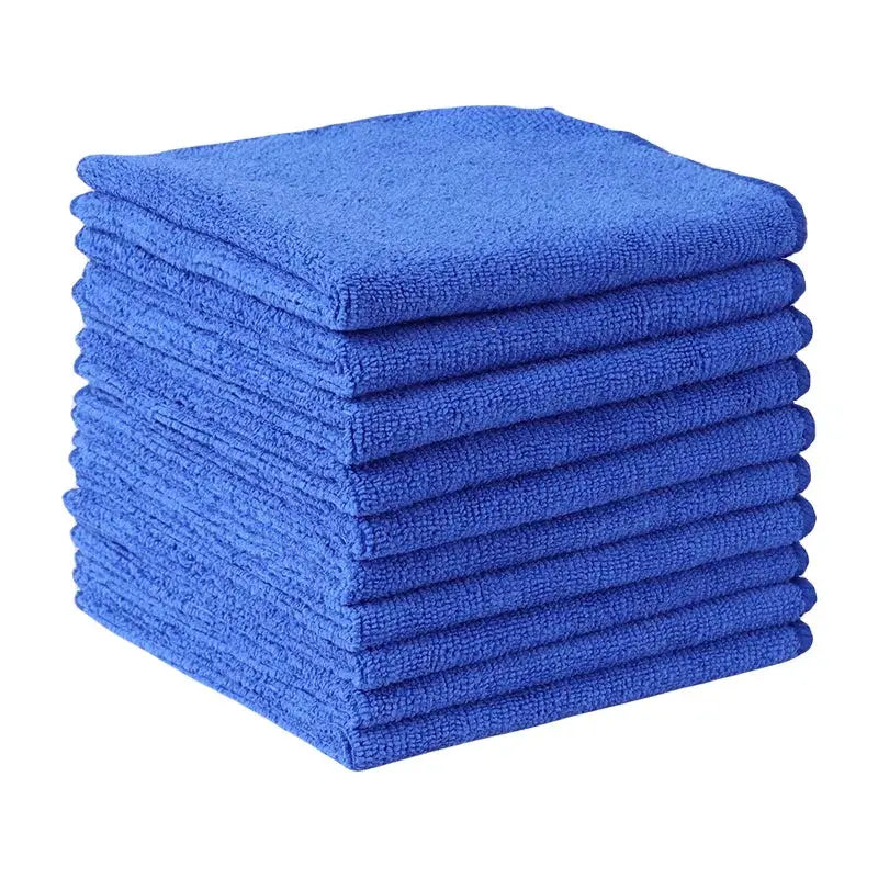 Blue microfiber car cleaning towels stacked in a neat pile